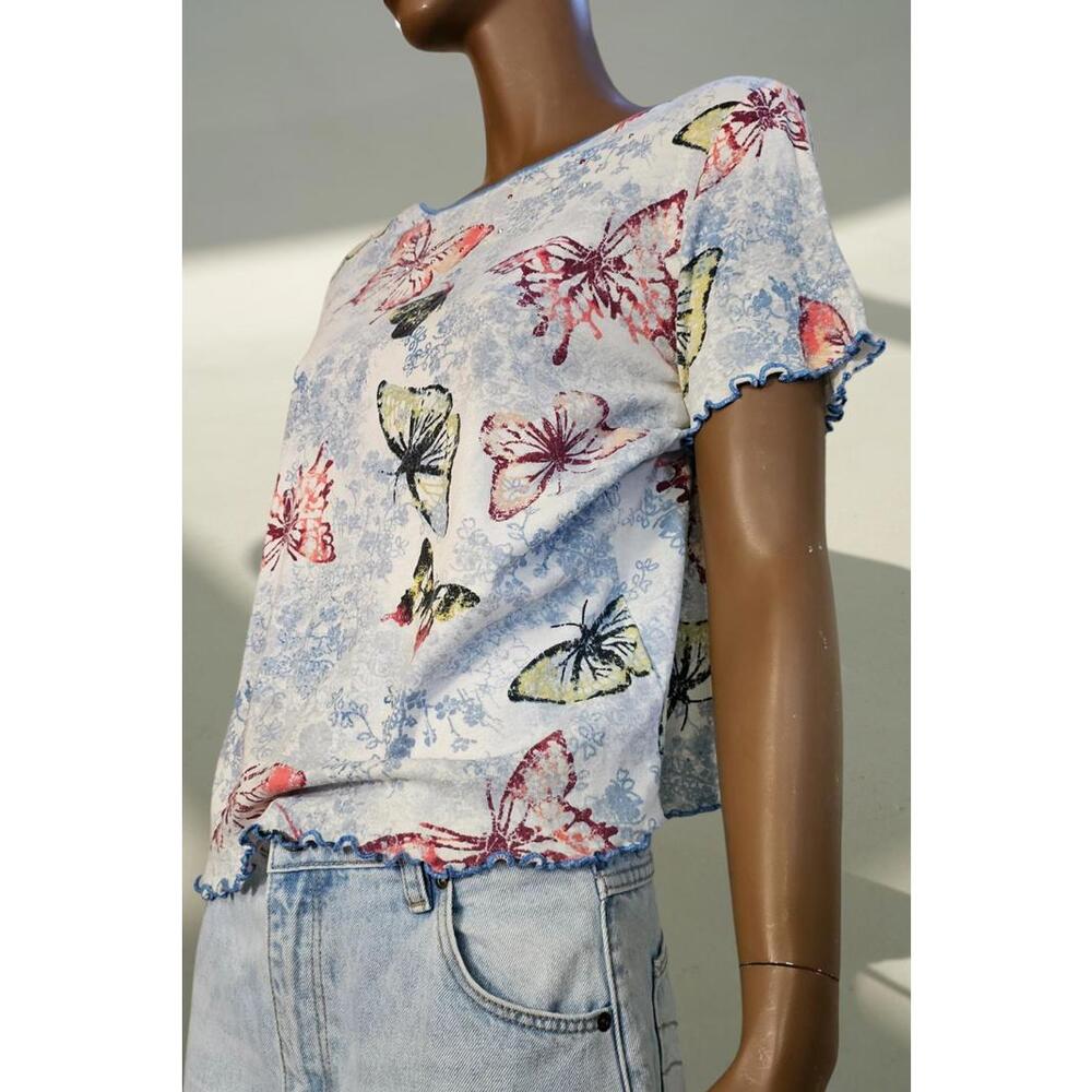 Vintage pastel blue t-shirt with different color butterflies all over size M